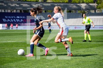 2021-04-24 - Clara Mateo of Paris FC and Maureen Bigot of FC Fleury fight for the ball during the Women's French championship D1 Arkema football match between Paris FC and FC Fleury 91 on April 24, 2021 at Charlety stadium in Paris, France - Photo Melanie Laurent / A2M Sport Consulting / DPPI - PARIS FC VS FC FLEURY 91 - FRENCH WOMEN DIVISION 1 - SOCCER