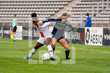 2021-05-06 - Sandy Baltimore of Paris Saint Germain and Tess Laplacette of Paris FC fight for the ball during the Women's French championship D1 Arkema football match between Paris FC and Paris Saint-Germain on May 6, 2021 at Charlety stadium in Paris, France - Photo Melanie Laurent / A2M Sport Consulting / DPPI - PARIS FC VS PARIS SAINT-GERMAIN - FRENCH WOMEN DIVISION 1 - SOCCER