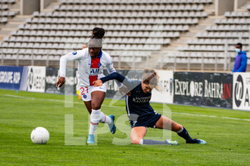 2021-05-06 - Sandy Baltimore of Paris Saint Germain and Tess Laplacette of Paris FC in a duel for the ball during the Women's French championship D1 Arkema football match between Paris FC and Paris Saint-Germain on May 6, 2021 at Charlety stadium in Paris, France - Photo Melanie Laurent / A2M Sport Consulting / DPPI - PARIS FC VS PARIS SAINT-GERMAIN - FRENCH WOMEN DIVISION 1 - SOCCER