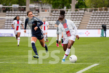2021-05-06 - Tess Laplacette of Paris FC and Sandy Baltimore of Paris Saint Germain controls the ball during the Women's French championship D1 Arkema football match between Paris FC and Paris Saint-Germain on May 6, 2021 at Charlety stadium in Paris, France - Photo Melanie Laurent / A2M Sport Consulting / DPPI - PARIS FC VS PARIS SAINT-GERMAIN - FRENCH WOMEN DIVISION 1 - SOCCER