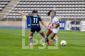 2021-05-06 - Clara Mateo of Paris FC and Ashley Lawrence of Paris Saint Germain fight for the ball during the Women's French championship D1 Arkema football match between Paris FC and Paris Saint-Germain on May 6, 2021 at Charlety stadium in Paris, France - Photo Melanie Laurent / A2M Sport Consulting / DPPI - PARIS FC VS PARIS SAINT-GERMAIN - FRENCH WOMEN DIVISION 1 - SOCCER
