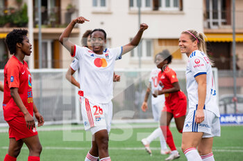 2021-05-09 - Eugenie Le Sommer of Olympique Lyonnais celebrates after scoring with Melvine Malard of Olympique Lyonnais during the Women's French championship D1 Arkema football match between GPSO 92 Issy and Olympique Lyonnais on May 9, 2021 at Le Gallo stadium in Boulogne-Billancourt, France - Photo Antoine Massinon / A2M Sport Consulting / DPPI - GPSO 92 ISSY VS OLYMPIQUE LYONNAIS - FRENCH WOMEN DIVISION 1 - SOCCER