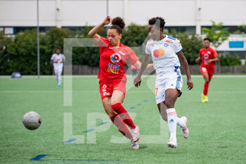2021-05-09 - Celya Barclais of GPSO 92 Issy and Vicki Becho of Olympique Lyonnais fight for the ball during the Women's French championship D1 Arkema football match between GPSO 92 Issy and Olympique Lyonnais on May 9, 2021 at Le Gallo stadium in Boulogne-Billancourt, France - Photo Antoine Massinon / A2M Sport Consulting / DPPI - GPSO 92 ISSY VS OLYMPIQUE LYONNAIS - FRENCH WOMEN DIVISION 1 - SOCCER