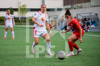 2021-05-09 - Eugenie Le Sommer of Olympique Lyonnais and Ella Kaabachi of GPSO 92 Issy fight for the ball during the Women's French championship D1 Arkema football match between GPSO 92 Issy and Olympique Lyonnais on May 9, 2021 at Le Gallo stadium in Boulogne-Billancourt, France - Photo Antoine Massinon / A2M Sport Consulting / DPPI - GPSO 92 ISSY VS OLYMPIQUE LYONNAIS - FRENCH WOMEN DIVISION 1 - SOCCER