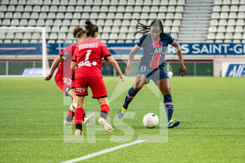 2021-06-04 - Solene Barbance of Dijon FCO and Kadidiatou Diani of Paris Saint Germain fight for the ball during the Women's French championship D1 Arkema football match between Paris Saint-Germain and Dijon FCO on June 4, 2021 at Jean Bouin stadium in Paris, France - Photo Antoine Massinon / A2M Sport Consulting / DPPI - PARIS SAINT-GERMAIN VS DIJON FCO - FRENCH WOMEN DIVISION 1 - SOCCER