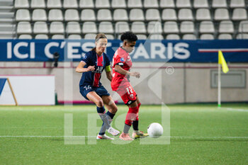2021-06-04 - Irene Paredes of Paris Saint Germain and Mylaine Tarrieu of Dijon FCO fight for the ball during the Women's French championship D1 Arkema football match between Paris Saint-Germain and Dijon FCO on June 4, 2021 at Jean Bouin stadium in Paris, France - Photo Antoine Massinon / A2M Sport Consulting / DPPI - PARIS SAINT-GERMAIN VS DIJON FCO - FRENCH WOMEN DIVISION 1 - SOCCER