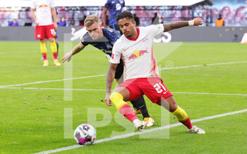 2020-10-24 - Justin Kluivert of Red Bull Leipzig and Maximilian Mittelstadt of Hertha Berlin during the German championship Bundesliga football match between Red Bull Leipzig and Hertha BSC Berlin on October 24, 2020 at Red Bull Arena in Leipzig, Germany - Photo Ralf Ibing / firo Sportphoto / DPPI - RED BULL LEIPZIG VS HERTHA BSC BERLIN - GERMAN BUNDESLIGA - SOCCER