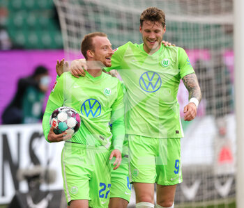2020-10-25 - Maximilian Arnold of Wolfsburg celebrates after his goal with Wout Weghorst during the German championship Bundesliga football match between VfL Wolfsburg and Arminia Bielefeld on October 25, 2020 at Volkswagen Arena in Wolfsburg, Germany - Photo Ralf Ibing / firo Sportphoto / DPPI - VFL WOLFSBURG AND ARMINIA BIELEFELD - GERMAN BUNDESLIGA - SOCCER