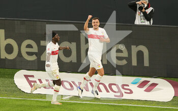 2020-12-12 - Philipp Forster of Stuttgart celebrates after the 1-3 goal with Tanguy Coulibaly during the German championship Bundesliga football match between Borussia Dortmund and VfB Stuttgart on December 12, 2020 at Signal Iduna Park in Dortmund, Germany - Photo Ralf Ibing / firo Sportphoto / DPPI - BORUSSIA DORTMUND VS VFB STUTTGART - GERMAN BUNDESLIGA - SOCCER