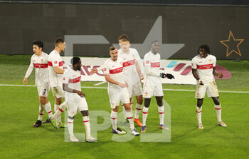 2020-12-12 - Tanguy Coulibaly of Stuttgart celebrates after the 1-4 goal with teammates during the German championship Bundesliga football match between Borussia Dortmund and VfB Stuttgart on December 12, 2020 at Signal Iduna Park in Dortmund, Germany - Photo Ralf Ibing / firo Sportphoto / DPPI - BORUSSIA DORTMUND VS VFB STUTTGART - GERMAN BUNDESLIGA - SOCCER