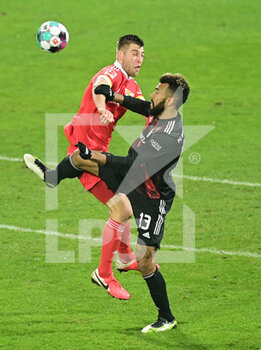 2020-12-12 - Eric Maxim Choupo-Moting of Bayern Munich and Robin Knoche of Union Berlin during the German championship Bundesliga football match between Union Berlin and Bayern Munich on December 12, 2020 at An der Alten Forsterei in Berlin, Germany - Photo Tim Groothuis / Witters / firo Sportphoto / DPPI - UNION BERLIN VS BAYERN MUNICH - GERMAN BUNDESLIGA - SOCCER