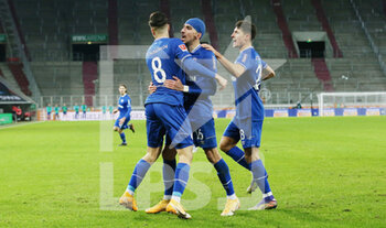2020-12-13 - Nassim Boujellab of Schalke 04 celebrates after the 1-2 goal with Suat Serdar and Alessandro Schopf during the German championship Bundesliga football match between FC Augsburg and FC Schalke 04 on December 13, 2020 at WWK Arena in Augsburg, Germany - Photo Max Ellerbrake / firo Sportphoto / DPPI - FC AUGSBURG VS FC SCHALKE 04 - GERMAN BUNDESLIGA - SOCCER