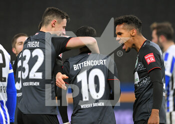 2021-01-23 - Leonardo Bittencourt of Werder Bremen celebrates after the 1-3 goal with Marco Friedl, Theodor Gebre Selassie during the German championship Bundesliga football match between Hertha BSC and SV Werder Bremen on January 23, 2021 at Olympiastadion in Berlin, Germany - Photo Frank Peters / Witters / firo Sportphoto / DPPI - HERTHA BSC AND SV WERDER BREMEN - GERMAN BUNDESLIGA - SOCCER