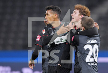 2021-01-23 - Joshua Sargent of Werder Bremen celebrates after his goal with Theodor Gebre Selassie and Romano Schmid during the German championship Bundesliga football match between Hertha BSC and SV Werder Bremen on January 23, 2021 at Olympiastadion in Berlin, Germany - Photo Frank Peters / Witters / firo Sportphoto / DPPI - HERTHA BSC AND SV WERDER BREMEN - GERMAN BUNDESLIGA - SOCCER
