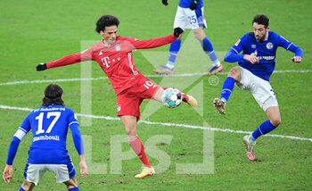2021-01-24 - Leroy Sane of Bayern Munich and Mark Uth of Schalke 04 during the German championship Bundesliga football match between Schalke 04 and Bayern Munich on January 24, 2021 at Veltins-Arena in Gelsenkirchen, Germany - Photo Tim Groothuis / Witters / firo Sportphoto / DPPI - SCHALKE 04 AND BAYERN MUNICH - GERMAN BUNDESLIGA - SOCCER