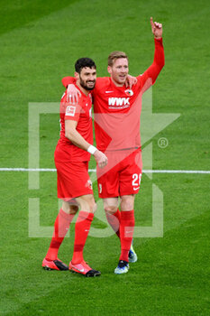 2021-01-30 - Andre Hahn of Augsburg celebrates after the 0-1 goal with Daniel Caligiuri during the German championship Bundesliga football match between Borussia Dortmund and FC Augsburg on January 30, 2021 at Signal Iduna Park in Dortmund, Germany - Photo Ulrich Hufnagel / firo sportphoto / DPPI - BORUSSIA DORTMUND AND FC AUGSBURG - GERMAN BUNDESLIGA - SOCCER
