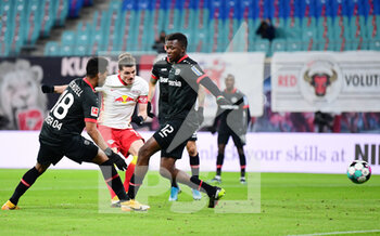 2021-01-30 - Marcel Sabitzer of RB Leipzig and Wendell, Edmond Tapsoba of Bayer 04 Leverkusen during the German championship Bundesliga football match between RB Leipzig and Bayer 04 Leverkusen on January 30, 2021 at Red Bull Arena in Leipzig, Germany - Photo Tim Groothuis / Witters / firo Sportphoto / DPPI - RB LEIPZIG AND BAYER 04 LEVERKUSEN - GERMAN BUNDESLIGA - SOCCER