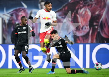 2021-01-30 - Christopher Nkunku of RB Leipzig and Charles Aranguiz of Bayer 04 Leverkusen during the German championship Bundesliga football match between RB Leipzig and Bayer 04 Leverkusen on January 30, 2021 at Red Bull Arena in Leipzig, Germany - Photo Tim Groothuis / Witters / firo Sportphoto / DPPI - RB LEIPZIG AND BAYER 04 LEVERKUSEN - GERMAN BUNDESLIGA - SOCCER