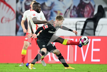 2021-01-30 - Daley Sinkgraven of Bayer 04 Leverkusen and Dayot Upamecano of RB Leipzig during the German championship Bundesliga football match between RB Leipzig and Bayer 04 Leverkusen on January 30, 2021 at Red Bull Arena in Leipzig, Germany - Photo Tim Groothuis / Witters / firo Sportphoto / DPPI - RB LEIPZIG AND BAYER 04 LEVERKUSEN - GERMAN BUNDESLIGA - SOCCER
