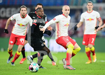 2021-01-30 - Moussa Diaby of Bayer 04 Leverkusen and Angelino of RB Leipzig during the German championship Bundesliga football match between RB Leipzig and Bayer 04 Leverkusen on January 30, 2021 at Red Bull Arena in Leipzig, Germany - Photo Tim Groothuis / Witters / firo Sportphoto / DPPI - RB LEIPZIG AND BAYER 04 LEVERKUSEN - GERMAN BUNDESLIGA - SOCCER