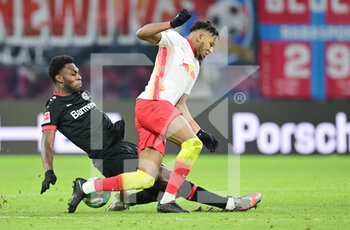 2021-01-30 - Christopher Nkunku of RB Leipzig and Timothy Fosu-Mensah of Bayer 04 Leverkusen during the German championship Bundesliga football match between RB Leipzig and Bayer 04 Leverkusen on January 30, 2021 at Red Bull Arena in Leipzig, Germany - Photo Tim Groothuis / Witters / firo Sportphoto / DPPI - RB LEIPZIG AND BAYER 04 LEVERKUSEN - GERMAN BUNDESLIGA - SOCCER