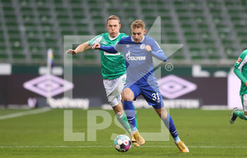 2021-01-30 - Timo Becker of Schalke and Ludwig Augustinsson of Werder during the German championship Bundesliga football match between Werder Bremen and Schalke 04 on January 30, 2021 at Weserstadion in Bremen, Germany - Photo Jurgen Fromme / firo sportphoto / DPPI - WERDER BREMEN AND SCHALKE 04 - GERMAN BUNDESLIGA - SOCCER