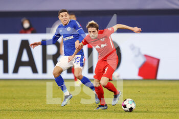 2021-02-06 - Kevin Kampl of RB Leipzig and Amine Harit of Schalke 04 during the German championship Bundesliga football match between FC Schalke 04 and RB Leipzig on February 6, 2021 at Veltins Arena in Gelsenkirchen, Germany - Photo Jurgen Fromme / firo sportphoto / DPPI - FC SCHALKE 04 AND RB LEIPZIG - GERMAN BUNDESLIGA - SOCCER