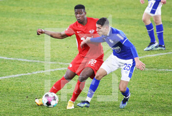 2021-02-06 - Nordi Mukiele of RB Leipzig and Amine Harit of Schalke 04 during the German championship Bundesliga football match between FC Schalke 04 and RB Leipzig on February 6, 2021 at Veltins Arena in Gelsenkirchen, Germany - Photo Roger Petzsche / Picture Point / Pool / firo sportphoto / DPPI - FC SCHALKE 04 AND RB LEIPZIG - GERMAN BUNDESLIGA - SOCCER