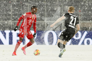 2021-02-15 - Bouna Sarr of Bayern Munich and Andreas Voglsammer of Arminia Bielefeld during the German championship Bundesliga football match between Bayern Munich and Arminia Bielefeld on February 15, 2021 at Allianz Arena in Munich, Germany - Photo Marcel Engelbrecht / firo Sportphoto / DPPI - BAYERN MUNICH AND ARMINIA BIELEFELD - GERMAN BUNDESLIGA - SOCCER