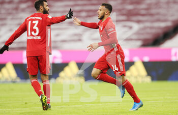 2021-02-15 - Corentin Tolisso of Bayern Munich celebrates after his goal with Eric Maxim Choupo-Moting during the German championship Bundesliga football match between Bayern Munich and Arminia Bielefeld on February 15, 2021 at Allianz Arena in Munich, Germany - Photo Marcel Engelbrecht / firo Sportphoto / DPPI - BAYERN MUNICH AND ARMINIA BIELEFELD - GERMAN BUNDESLIGA - SOCCER
