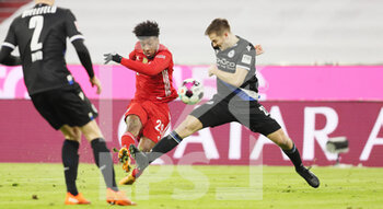2021-02-15 - Kingsley Coman of Bayern Munich and Cedric Brunner of Arminia Bielefeld during the German championship Bundesliga football match between Bayern Munich and Arminia Bielefeld on February 15, 2021 at Allianz Arena in Munich, Germany - Photo Marcel Engelbrecht / firo Sportphoto / DPPI - BAYERN MUNICH AND ARMINIA BIELEFELD - GERMAN BUNDESLIGA - SOCCER