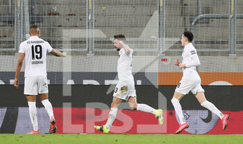 2021-03-12 - Marco Richter of Augsburg celebrates the 2-1 goal during the German championship Bundesliga football match between FC Augsburg and VfL Borussia Moenchengladbach on March 12, 2021 at WWK Arena in Augsburg, Germany - Photo Marcel Engelbrecht / firo Sportphoto / DPPI - FC AUGSBURG AND VFL BORUSSIA MOENCHENGLADBACH - GERMAN BUNDESLIGA - SOCCER