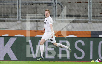 2021-03-12 - Andre Hahn of Augsburg celebrates the 3-1 goal during the German championship Bundesliga football match between FC Augsburg and VfL Borussia Moenchengladbach on March 12, 2021 at WWK Arena in Augsburg, Germany - Photo Marcel Engelbrecht / firo Sportphoto / DPPI - FC AUGSBURG AND VFL BORUSSIA MOENCHENGLADBACH - GERMAN BUNDESLIGA - SOCCER