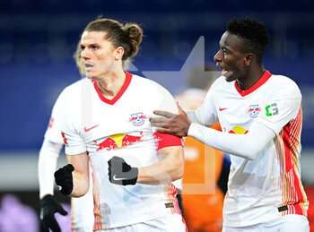 2021-03-19 - Marcel Sabitzer of RB Leipzig celebrates after his goal with Amadou Haidara during the German championship Bundesliga football match between Arminia Bielefeld and RB Leipzig on March 19, 2021 at the Schueco Arena in Bielefeld, Germany - Photo Tim Groothuis / Witters / firo sportphoto / DPPI - ARMINIA BIELEFELD AND RB LEIPZIG - GERMAN BUNDESLIGA - SOCCER