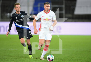 2021-03-19 - Willi Orban of RB Leipzig and Michel Vlap of Arminia Bielefeld during the German championship Bundesliga football match between Arminia Bielefeld and RB Leipzig on March 19, 2021 at the Schueco Arena in Bielefeld, Germany - Photo Tim Groothuis / Witters / firo sportphoto / DPPI - ARMINIA BIELEFELD AND RB LEIPZIG - GERMAN BUNDESLIGA - SOCCER