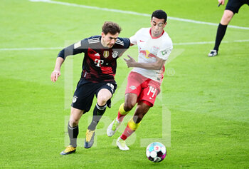 2021-04-03 - Leon Goretzka of Bayern Munich and Tyler Adams of RB Leipzig during the German championship Bundesliga football match between RB Leipzig and Bayern Munich on April 3, 2021 at Red Bull Arena in Leipzig, Germany - Photo Valeria Witters / Witters / firo sportphoto / DPPI - RB LEIPZIG VS BAYERN MUNICH - GERMAN BUNDESLIGA - SOCCER