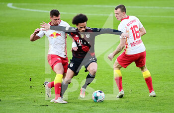 2021-04-03 - Leroy Sane of Bayern Munich and Willi Orban, Lukas Klostermann of RB Leipzig during the German championship Bundesliga football match between RB Leipzig and Bayern Munich on April 3, 2021 at Red Bull Arena in Leipzig, Germany - Photo Valeria Witters / Witters / firo sportphoto / DPPI - RB LEIPZIG VS BAYERN MUNICH - GERMAN BUNDESLIGA - SOCCER