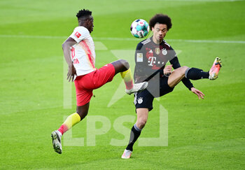 2021-04-03 - Amadou Haidara of RB Leipzig and Leroy Sane of Bayern Munich during the German championship Bundesliga football match between RB Leipzig and Bayern Munich on April 3, 2021 at Red Bull Arena in Leipzig, Germany - Photo Valeria Witters / Witters / firo sportphoto / DPPI - RB LEIPZIG VS BAYERN MUNICH - GERMAN BUNDESLIGA - SOCCER