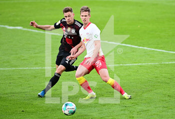 2021-04-03 - Joshua Kimmich of Bayern Munich and Dani Olmo of RB Leipzig during the German championship Bundesliga football match between RB Leipzig and Bayern Munich on April 3, 2021 at Red Bull Arena in Leipzig, Germany - Photo Valeria Witters / Witters / firo sportphoto / DPPI - RB LEIPZIG VS BAYERN MUNICH - GERMAN BUNDESLIGA - SOCCER