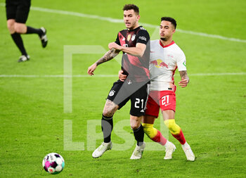 2021-04-03 - Lucas Hernandez of Bayern Munich and Justin Kluivert of RB Leipzig during the German championship Bundesliga football match between RB Leipzig and Bayern Munich on April 3, 2021 at Red Bull Arena in Leipzig, Germany - Photo Valeria Witters / Witters / firo sportphoto / DPPI - RB LEIPZIG VS BAYERN MUNICH - GERMAN BUNDESLIGA - SOCCER