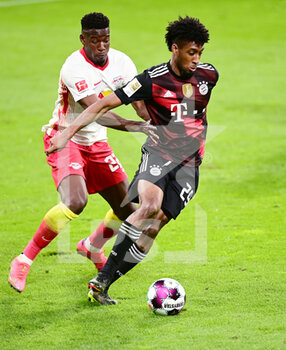 2021-04-03 - Kingsley Coman of Bayern Munich and Nordi Mukiele of RB Leipzig during the German championship Bundesliga football match between RB Leipzig and Bayern Munich on April 3, 2021 at Red Bull Arena in Leipzig, Germany - Photo Valeria Witters / Witters / firo sportphoto / DPPI - RB LEIPZIG VS BAYERN MUNICH - GERMAN BUNDESLIGA - SOCCER