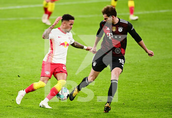 2021-04-03 - Justin Kluivert of RB Leipzig and Leon Goretzka of Bayern Munich during the German championship Bundesliga football match between RB Leipzig and Bayern Munich on April 3, 2021 at Red Bull Arena in Leipzig, Germany - Photo Valeria Witters / Witters / firo sportphoto / DPPI - RB LEIPZIG VS BAYERN MUNICH - GERMAN BUNDESLIGA - SOCCER