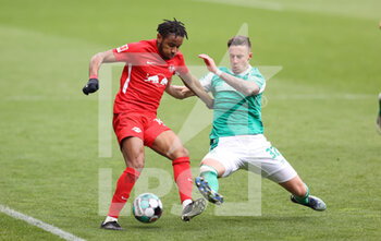 2021-04-10 - Christopher Nkunku of RB Leipzig and Marco Friedl of Werder Bremen during the German championship Bundesliga football match between Werder Bremen and RB Leipzig on April 10, 2021 at Weserstadion in Bremen, Germany - Photo Jurgen Fromme / firo Sportphoto / DPPI - WERDER BREMEN VS RB LEIPZIG - GERMAN BUNDESLIGA - SOCCER