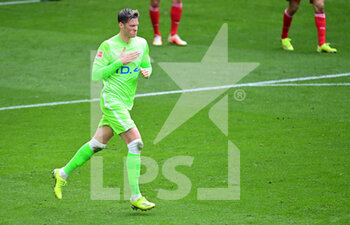 2021-04-17 - Wout Weghorst of Wolfsburg celebrates after the 1-2 goal during the German championship Bundesliga football match between VfL Wolfsburg and Bayern Munich on April 17, 2021 at Volkswagen Arena in Wolfsburg, Germany - Photo Tim Groothuis / Witters / firosportphoto / DPPI - VFL WOLFSBURG VS BAYERN MUNICH - GERMAN BUNDESLIGA - SOCCER