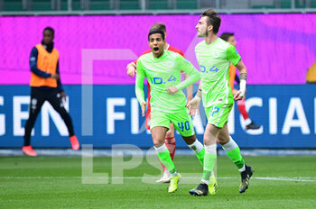 2021-04-17 - Maximilian Philipp of Wolfsburg celebrates after the 2-3 goal with Joao Victor during the German championship Bundesliga football match between VfL Wolfsburg and Bayern Munich on April 17, 2021 at Volkswagen Arena in Wolfsburg, Germany - Photo Tim Groothuis / Witters / firosportphoto / DPPI - VFL WOLFSBURG VS BAYERN MUNICH - GERMAN BUNDESLIGA - SOCCER