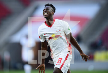 2021-04-20 - Amadou Haidara of Leipzig celebrates after the 1-1 goal during the German championship Bundesliga football match between FC Koln and RB Leipzig on April 20, 2021 at RheinEnergieStadion in Koln, Germany - Photo Leonie Horky / Witters / firo sportphoto / DPPI - FC KOLN VS RB LEIPZIG - GERMAN BUNDESLIGA - SOCCER