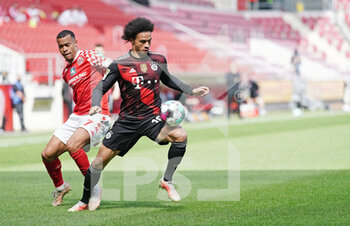 2021-04-24 - Leroy Sane of Bayern Munich and Robin Quaison of Mainz during the German championship Bundesliga football match between FSV Mainz 05 and Bayern Munich on April 24, 2021 at Opel Arena in Mainz, Germany - Photo Thorsten Wagner / Witters / firo sportphoto / DPPI - FSV MAINZ 05 VS BAYERN MUNICH - GERMAN BUNDESLIGA - SOCCER