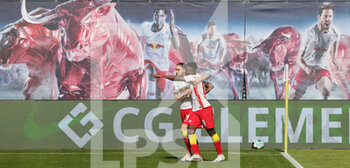 2021-04-25 - Amadou Haidara of RB Leipzig celebrates after his goal with Kevin Kampl during the German championship Bundesliga football match between Red Bull Leipzig and VfB Stuttgart on April 25, 2021 at Red Bull Arena in Leipzig, Germany - Photo Ralf Ibing / firo Sportphoto / DPPI - RED BULL LEIPZIG VS VFB STUTTGART - GERMAN BUNDESLIGA - SOCCER