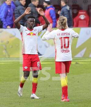 2021-04-25 - Amadou Haidara of RB Leipzig celebrates with Emil Forsberg during the German championship Bundesliga football match between Red Bull Leipzig and VfB Stuttgart on April 25, 2021 at Red Bull Arena in Leipzig, Germany - Photo Ralf Ibing / firo Sportphoto / DPPI - RED BULL LEIPZIG VS VFB STUTTGART - GERMAN BUNDESLIGA - SOCCER