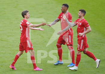 2021-05-08 - Thomas Mueller of Bayern Munich celebrates after his goal 2-0 with Jerome Boateng, Lucas Hernandez during the German championship Bundesliga football match between Bayern Munich and Borussia Moenchengladbach on May 8, 2021 at Allianz Arena in Munich, Germany - Photo Lennart Preiss / Witters / firo sportphoto / DPPI - BAYERN MUNICH VS BORUSSIA MOENCHENGLADBACH - GERMAN BUNDESLIGA - SOCCER